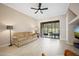 Cozy living room area with comfortable seating and sliding glass door to the porch at 1128 Hansberry Ct, Ormond Beach, FL 32174