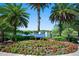 Welcome to Prestwick Park, a community surrounded by lush greenery, beautiful red flowers and palm trees at 1128 Hansberry Ct, Ormond Beach, FL 32174