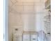 Functional closet with shelving, storage containers, and ample space for organizing items at 1404 Newry Cir, Ormond Beach, FL 32174