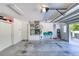 Attached garage with room for storage and a work area at 1404 Newry Cir, Ormond Beach, FL 32174