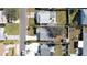 Aerial view of the property showcasing the lot layout, house, and detached garage at 151 Holland Rd, Ormond Beach, FL 32176