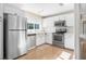 Updated kitchen with stainless steel appliances and bright natural light at 2120 Queen Palm Dr, Edgewater, FL 32141