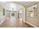 Open-concept living space featuring tile flooring and seamless flow into the kitchen at 2120 Queen Palm Dr, Edgewater, FL 32141