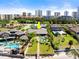 Waterfront property featuring lush landscaping, a private pool, and a private dock at 2924 River Point Dr, Daytona Beach, FL 32118