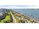Beautiful waterfront community with lush landscapes, private docks, and city views in the distance at 2924 River Point Dr, Daytona Beach, FL 32118