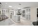 Spacious kitchen with stainless steel appliances, a large island, and ample cabinet space at 2924 River Point Dr, Daytona Beach, FL 32118