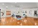 Spacious living room with hardwood floors, skylights, and a stylish layout perfect for modern living at 2924 River Point Dr, Daytona Beach, FL 32118