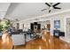 Open living room featuring hardwood floors, modern furniture, and stylish decor throughout at 2924 River Point Dr, Daytona Beach, FL 32118