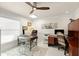 Bright office with two desks, large window with blinds, and tile flooring at 2924 River Point Dr, Daytona Beach, FL 32118