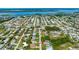 Waterfront homes in an established neighborhood boast lush greenery and well-maintained properties in this gorgeous aerial view at 32 Ocean Breeze Cir, Ormond Beach, FL 32176