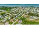 Gorgeous neighborhood aerial showcasing a waterfront community with mature landscaping and beautiful single Gathering homes at 32 Ocean Breeze Cir, Ormond Beach, FL 32176