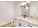 Well-lit bathroom with white vanity, marble countertop, and a glass-enclosed shower at 32 Ocean Breeze Cir, Ormond Beach, FL 32176