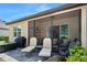 Screened in patio featuring lounge chairs and outdoor seating area at 3205 Bailey Ann Dr, Ormond Beach, FL 32174