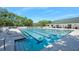 Community pool with plenty of deck space and lounge chairs at 3205 Bailey Ann Dr, Ormond Beach, FL 32174