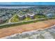 Breathtaking aerial view of a beachfront condo with ocean views and direct beach access at 3370 Ocean Shore Blvd # 206B, Ormond Beach, FL 32176