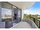 Spacious balcony with ocean views featuring a black metal guardrail at 3370 Ocean Shore Blvd # 206B, Ormond Beach, FL 32176