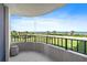 Spacious balcony with ocean views featuring a black metal guardrail at 3370 Ocean Shore Blvd # 206B, Ormond Beach, FL 32176