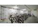 Secured bike storage area with numbered storage lockers and multiple bike racks at 3370 Ocean Shore Blvd # 206B, Ormond Beach, FL 32176