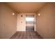 Hallway with elevator at the complex for the convenience of residents at 3370 Ocean Shore Blvd # 206B, Ormond Beach, FL 32176
