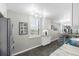 Bright kitchen featuring subway tiles, stainless steel appliances, and granite countertops at 3370 Ocean Shore Blvd # 206B, Ormond Beach, FL 32176