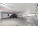 Spacious, well-lit parking garage with designated parking spots at 3370 Ocean Shore Blvd # 206B, Ormond Beach, FL 32176