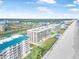 Coastal condominiums boasting beachfront living, manicured lawns, and a refreshing community pool for residents at 4631 S Atlantic Ave # 8706, Ponce Inlet, FL 32127
