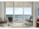The balcony has a great ocean view with comfortable seating for enjoying the scenery at 4631 S Atlantic Ave # 8706, Ponce Inlet, FL 32127