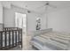 Cozy bedroom featuring an ensuite bathroom and a closet at 4631 S Atlantic Ave # 8706, Ponce Inlet, FL 32127