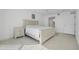 Spacious bedroom features a ceiling fan and neutral color palette at 4631 S Atlantic Ave # 8706, Ponce Inlet, FL 32127