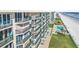 Luxury condominiums featuring private balconies, well-maintained grounds, and a community pool with beachfront access at 4631 S Atlantic Ave # 8706, Ponce Inlet, FL 32127