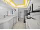 Well-lit kitchen features white cabinets, appliances, and tile flooring at 4631 S Atlantic Ave # 8706, Ponce Inlet, FL 32127
