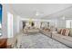 Spacious living room featuring tile floors, ceiling fan, and an open layout at 4631 S Atlantic Ave # 8706, Ponce Inlet, FL 32127