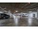 A well-lit parking garage showing designated parking spots at 4631 S Atlantic Ave # 8706, Ponce Inlet, FL 32127