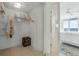 A walk-in closet with built-in shelving and hanging space next to the Primary bedroom at 4631 S Atlantic Ave # 8706, Ponce Inlet, FL 32127