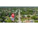 Neighborhood aerial view of home near the water, showcasing nearby homes and mature trees at 48 Rosewood Ave, Ormond Beach, FL 32174