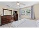 Bedroom featuring a large dresser, and bright windows that bring in natural light at 48 Rosewood Ave, Ormond Beach, FL 32174
