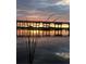 Scenic bridge view at sunset with striking reflections on the calm water for a serene atmosphere at 48 Rosewood Ave, Ormond Beach, FL 32174