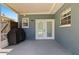 Back patio featuring access to home at 48 Rosewood Ave, Ormond Beach, FL 32174