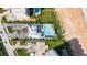Aerial view of a condo building, pool, parking and beach access at 540 Good Life Way, Daytona Beach, FL 32124