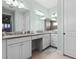 Well-lit bathroom with double vanity, granite countertops, and ample storage for a luxurious feel at 540 Good Life Way, Daytona Beach, FL 32124