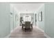 Formal dining room with natural light, chandelier, and comfortable seating for six at 540 Good Life Way, Daytona Beach, FL 32124