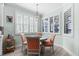Dining nook featuring shuttered windows and seating for four with a stylish pendant light at 540 Good Life Way, Daytona Beach, FL 32124