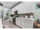 Kitchen showing appliances, ample counter space, and plenty of white cabinets for storage at 540 Good Life Way, Daytona Beach, FL 32124