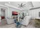 Bright living room with recessed lights, ceiling fan, coastal decor, and comfortable seating at 540 Good Life Way, Daytona Beach, FL 32124