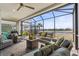The large screened patio provides outdoor seating and gorgeous views of the lake at 540 Good Life Way, Daytona Beach, FL 32124