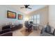 Bright office space featuring a modern desk, sleek furnishings, and shuttered windows for natural light at 5431 Hutchinson St, Port Orange, FL 32128