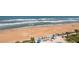 Aerial view of the beach community and pool area at 1155 Ocean Shore Blvd # 702, Ormond Beach, FL 32176