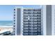 Close-up of condo balconies overlooking ocean, showcasing spacious outdoor living at 1155 Ocean Shore Blvd # 702, Ormond Beach, FL 32176