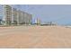 Beachfront view of nearby condo buildings provides easy access to sandy shores at 1155 Ocean Shore Blvd # 702, Ormond Beach, FL 32176