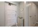 Inviting entryway with storage cabinet and coastal decor, leading into a beautifully designed condo at 1155 Ocean Shore Blvd # 702, Ormond Beach, FL 32176